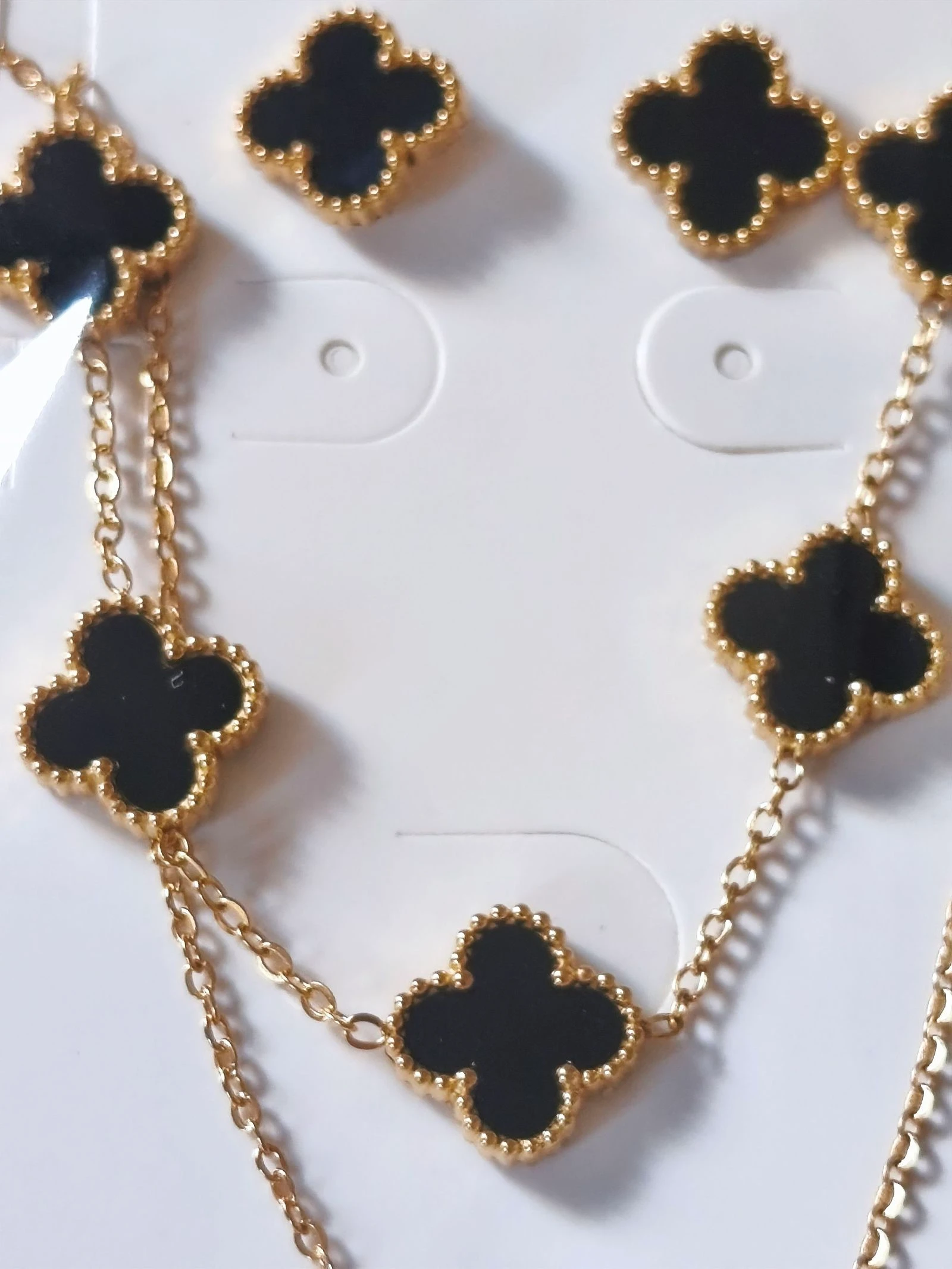 Set de choker, armband en klavertjesoorhangers – photo 2